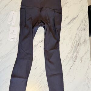 Athleta Salutation Stash leggings Black